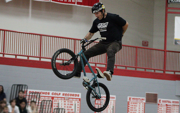 BMX athlete performs an aerial feat