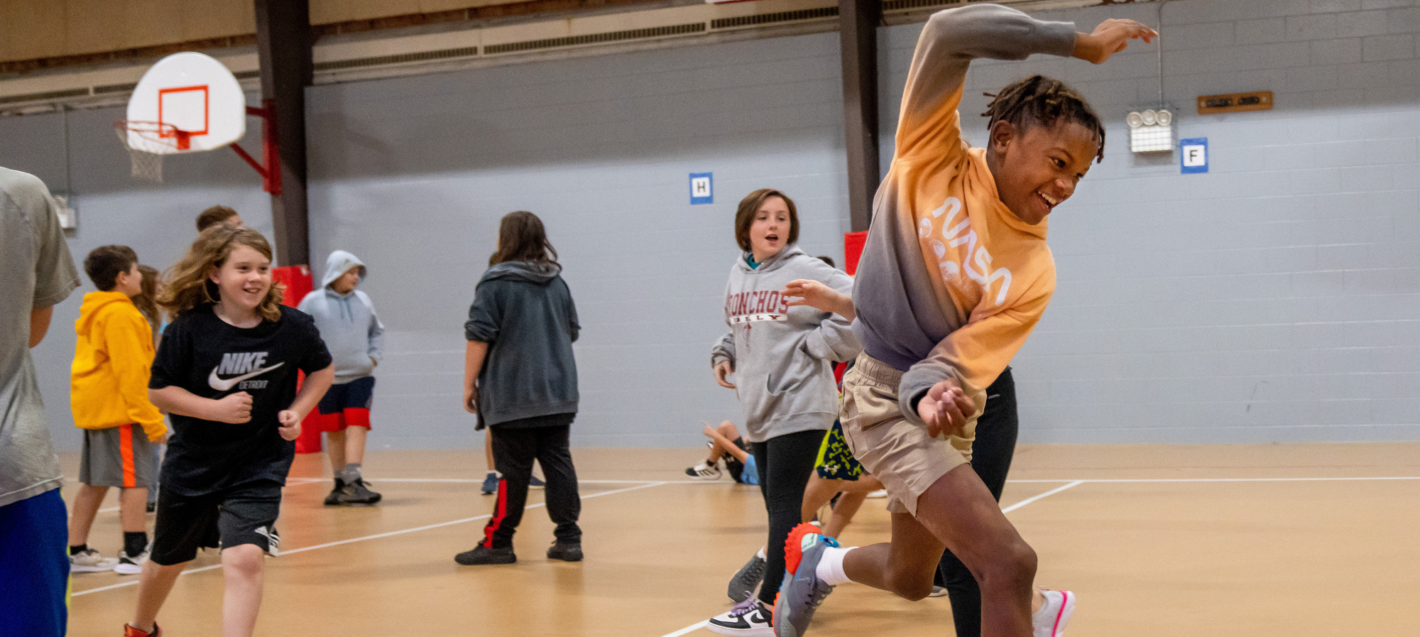 Students playing in the gym