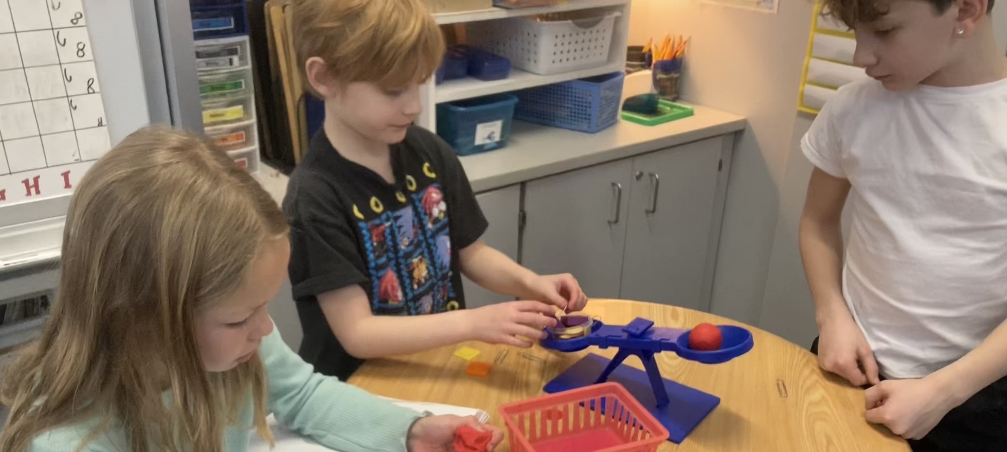 Students working with math tools
