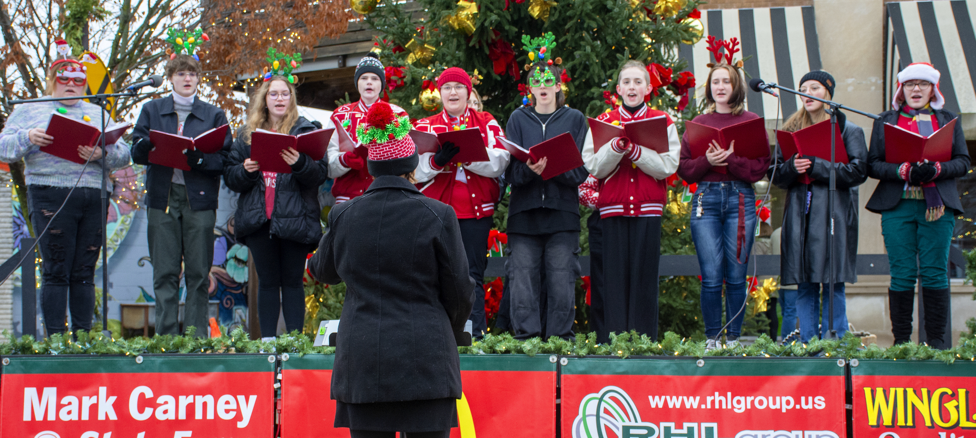 Students singing at the Dicken's Festival